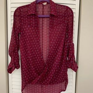 3/20 Burgundy wrap front printed blouse size M. Sheer.